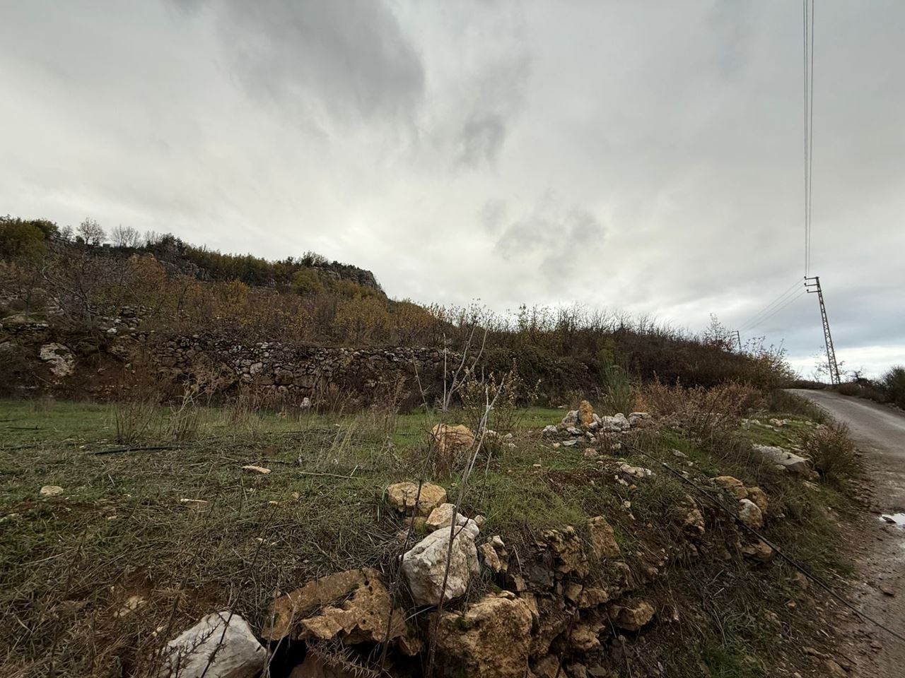 Land with a mountain view for sale in Kfarzebian, Keserwan