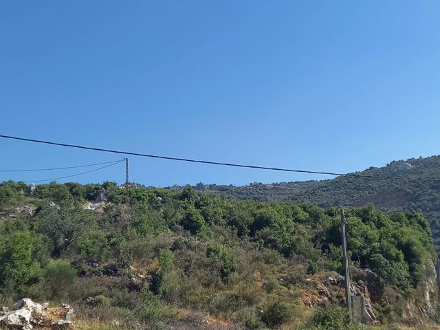 Land with a mountain view for sale in Assia, Batroun