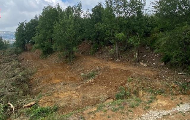 Land with a mountain view for sale in Kfarzebian, Keserwan