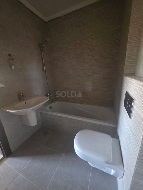 Apartment with a mountain view for sale in Amioun, Koura - photo 2
