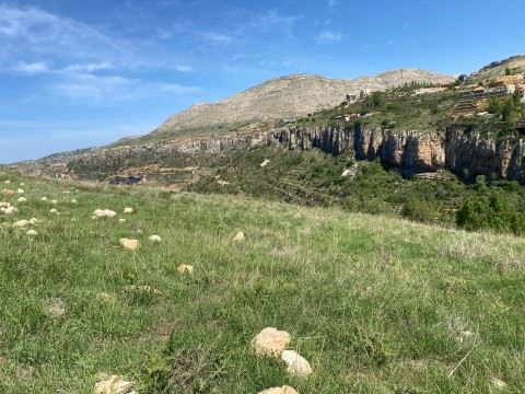 Land with a mountain view for sale in Kfarzebian, Keserwan