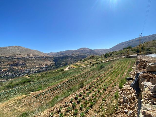 Land with a mountain view for sale in Kfarzebian, Keserwan
