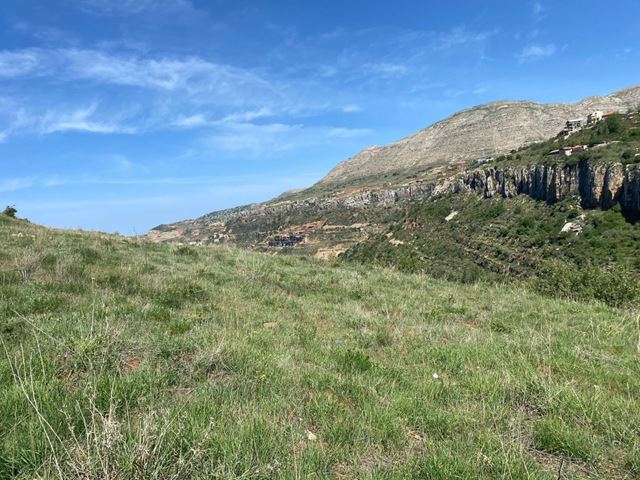 Land with a mountain view for sale in Kfarzebian, Keserwan