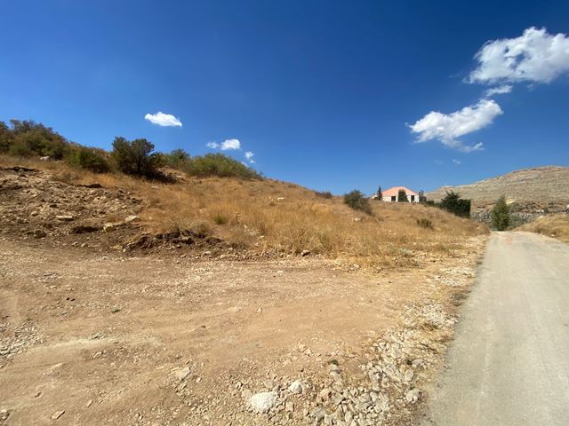 Land with a mountain view for sale in Kfarzebian, Keserwan