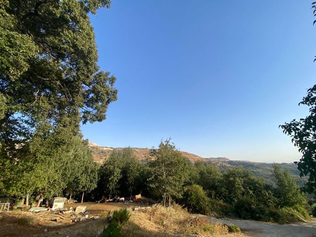Land with a mountain view for sale in Kfarzebian, Keserwan
