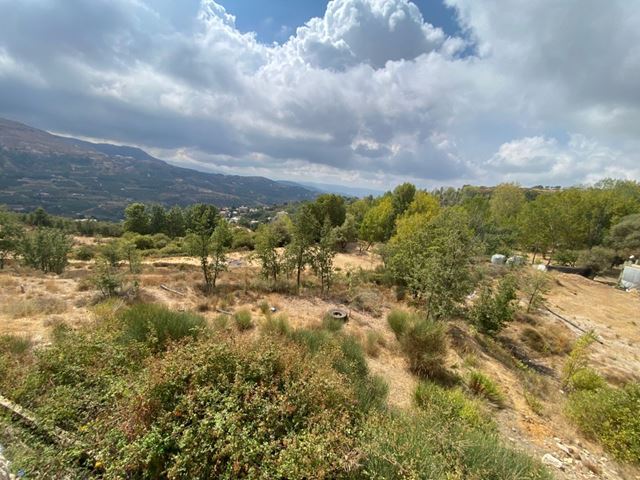Land with a mountain view for sale in Kfarzebian, Keserwan
