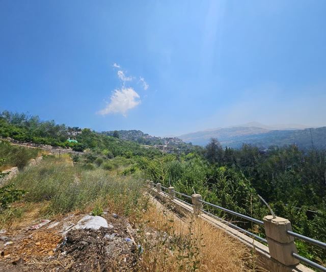 Land with a mountain view for sale in Kfarzebian, Keserwan